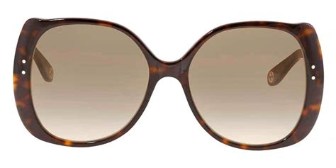 Gucci™ GG0472S 002 56 Havana Sunglasses .